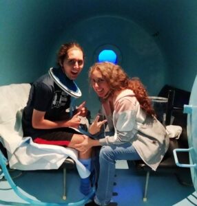 Peter and Mom seated in Hyperbaric Oxygen Tank